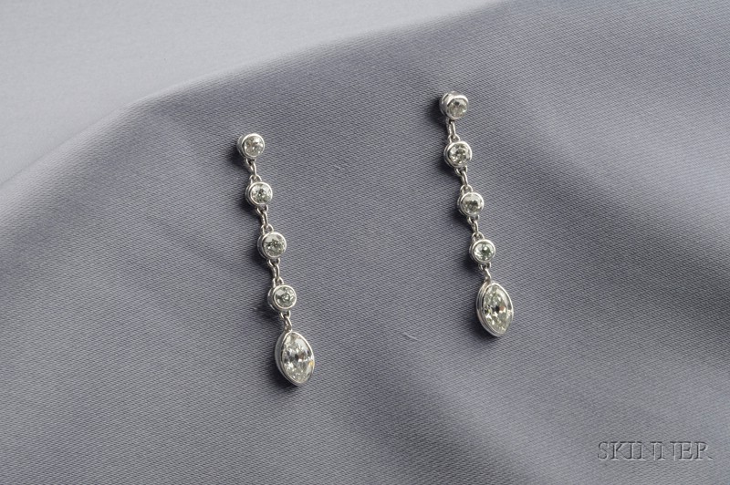 Appraisal: Platinum and Diamond Earpendants each set with a line of