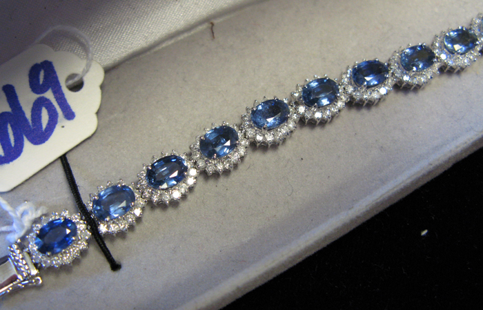 Appraisal: SAPPHIRE DIAMOND AND FOURTEEN KARAT WHITE GOLD TENNIS BRACELET WITH