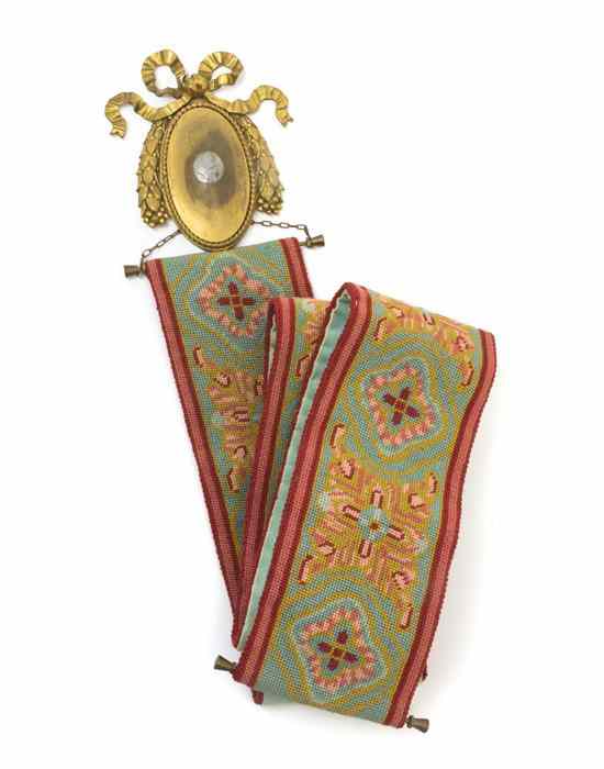 Appraisal: An Embroidered Victorian Bell Pull having stylized floral decoration set