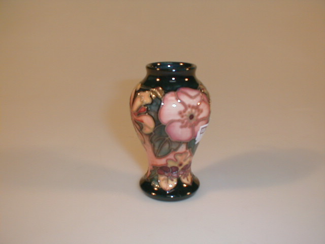 Appraisal: A small modern Moorcroft vase with honeysuckle and dog rose