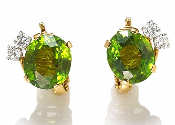 Appraisal: A pair of diamond peridot and k gold earclips Tiffany