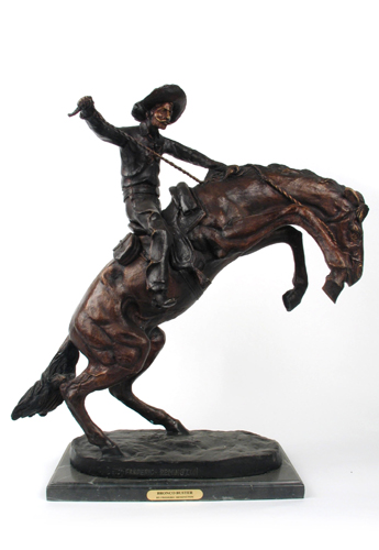 Appraisal: AFTER FREDERIC SACKRIDER REMINGTON American - Bronco Buster patinated bronze