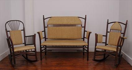 Appraisal: BENTWOOD SETTEE AND TWO ROCKING CHAIRS The settee with arched