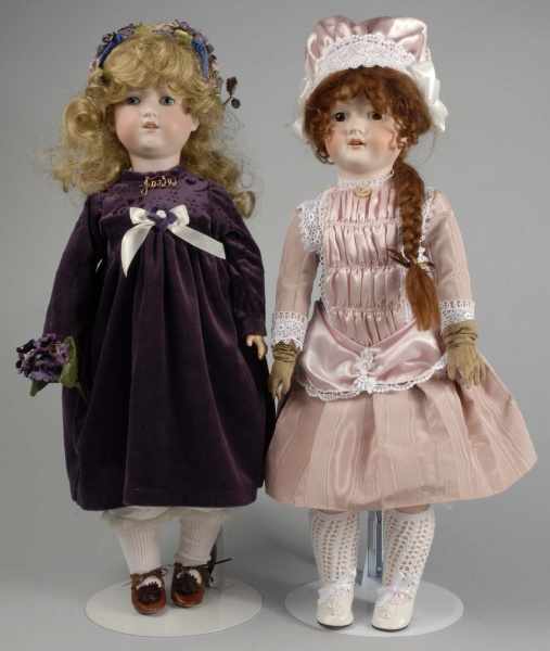 Appraisal: Lot of Pretty German Bisque Child Dolls Description Bisque socket