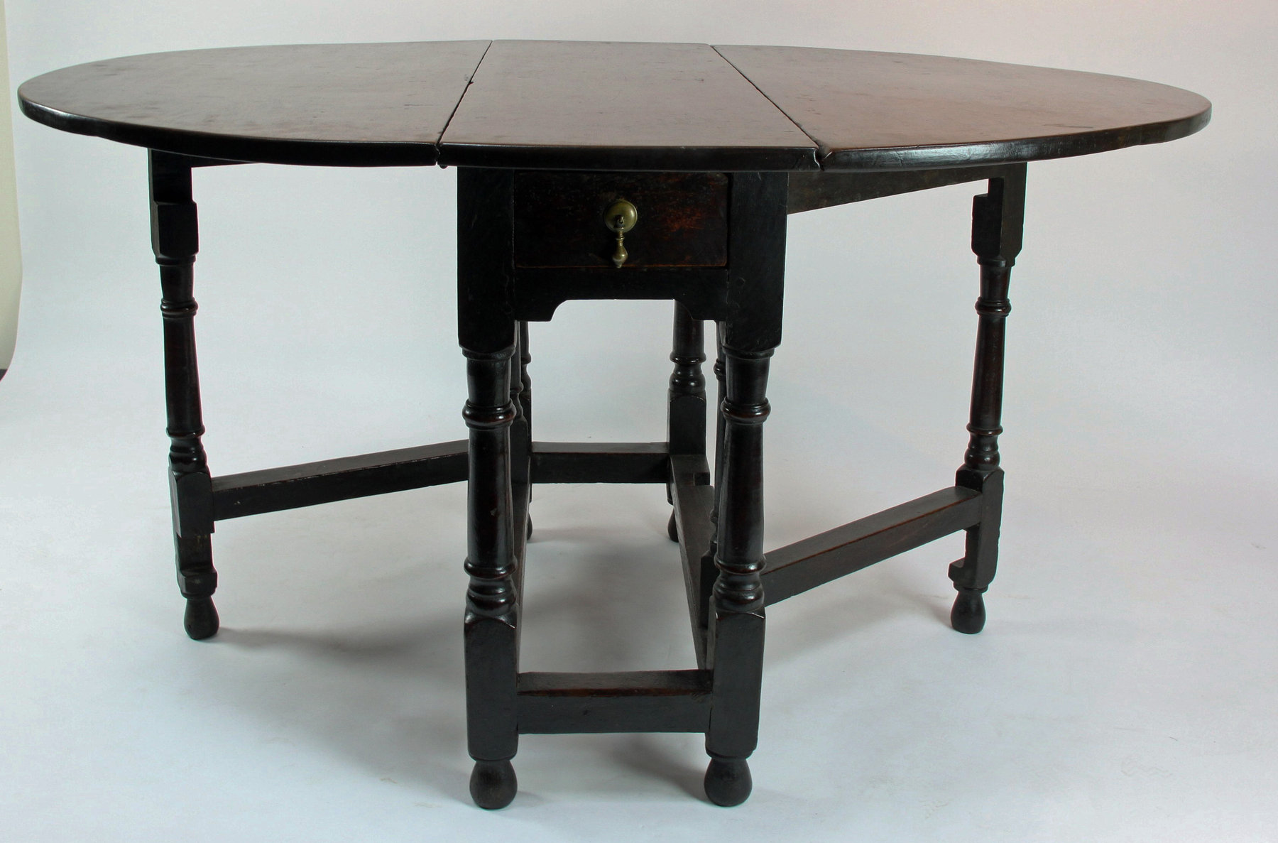 Appraisal: A late th Century oak gateleg table circa with two-flap