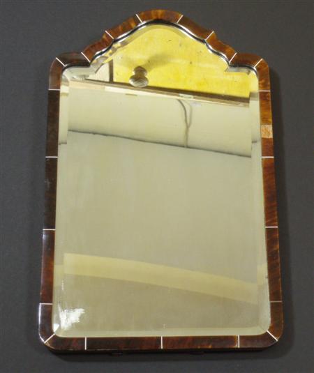 Appraisal: An Edwardian tortoiseshell framed strut dressing glass with bevelled mirror