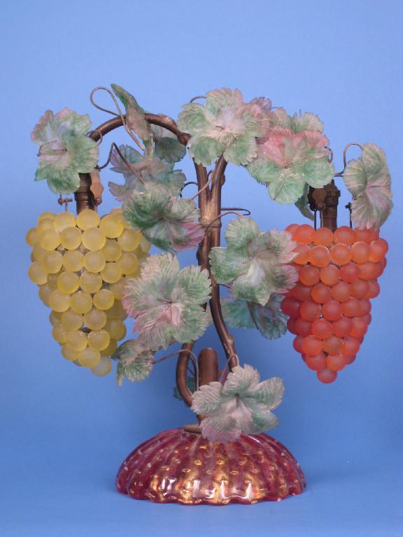 Appraisal: A Venetian glass Vine Lamp with two branches on naturalistic