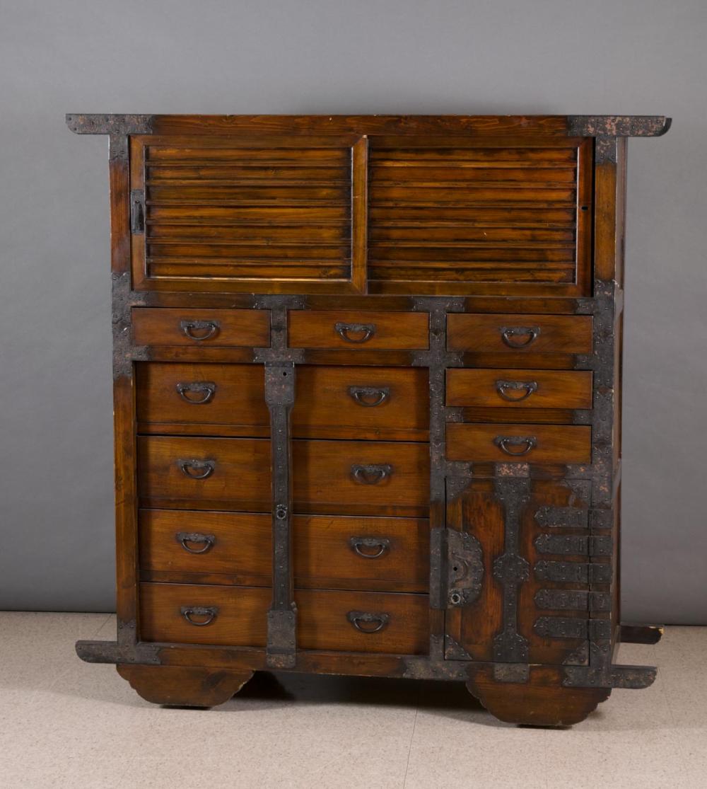 Appraisal: JAPANESE CHOBA TANSU MERCHANT CHEST ON WHEELS also having a