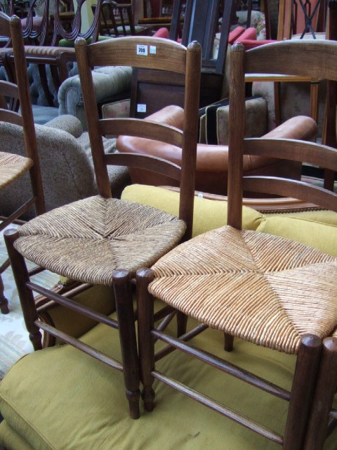 Appraisal: A set of six French ash dining chairs with seagrass