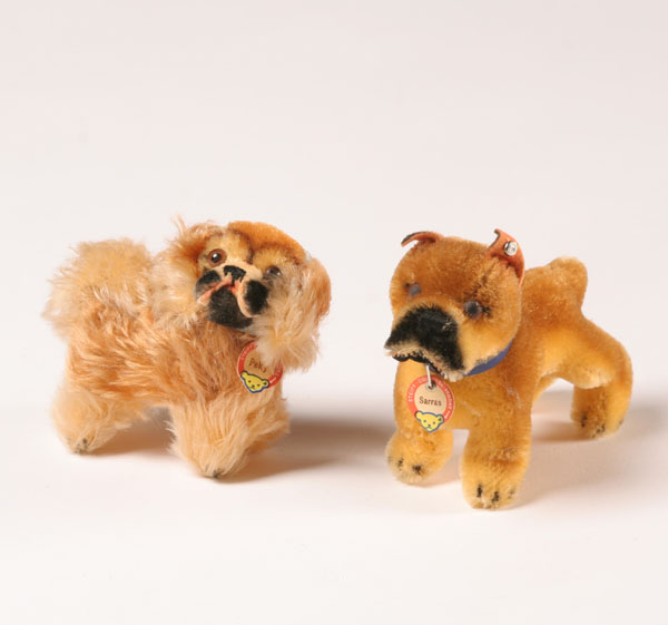 Appraisal: Vintage Steiff dogs Saras and Peky one jointed both with