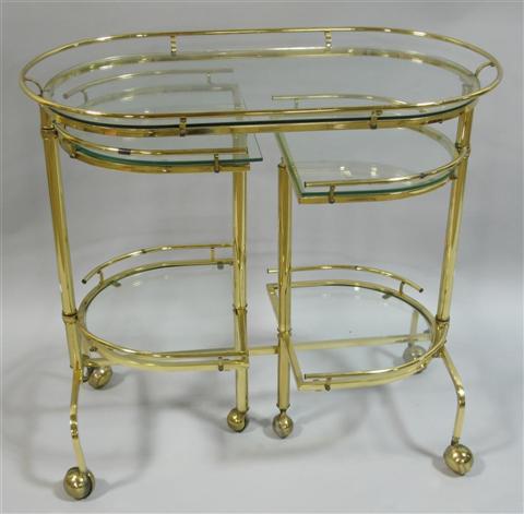 Appraisal: BRASS AND GLASS ROLLING BAR TEA CART th century the