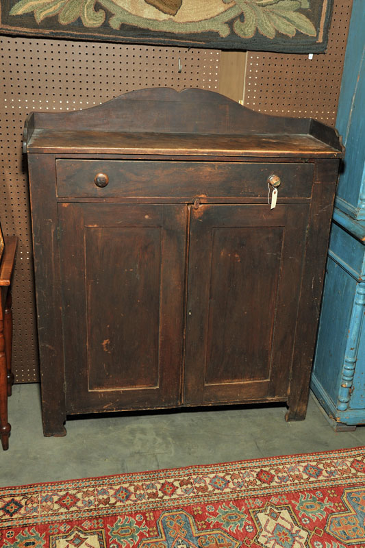 Appraisal: JELLY CUPBOARD Brown painted cupboard having a shaped gallery and