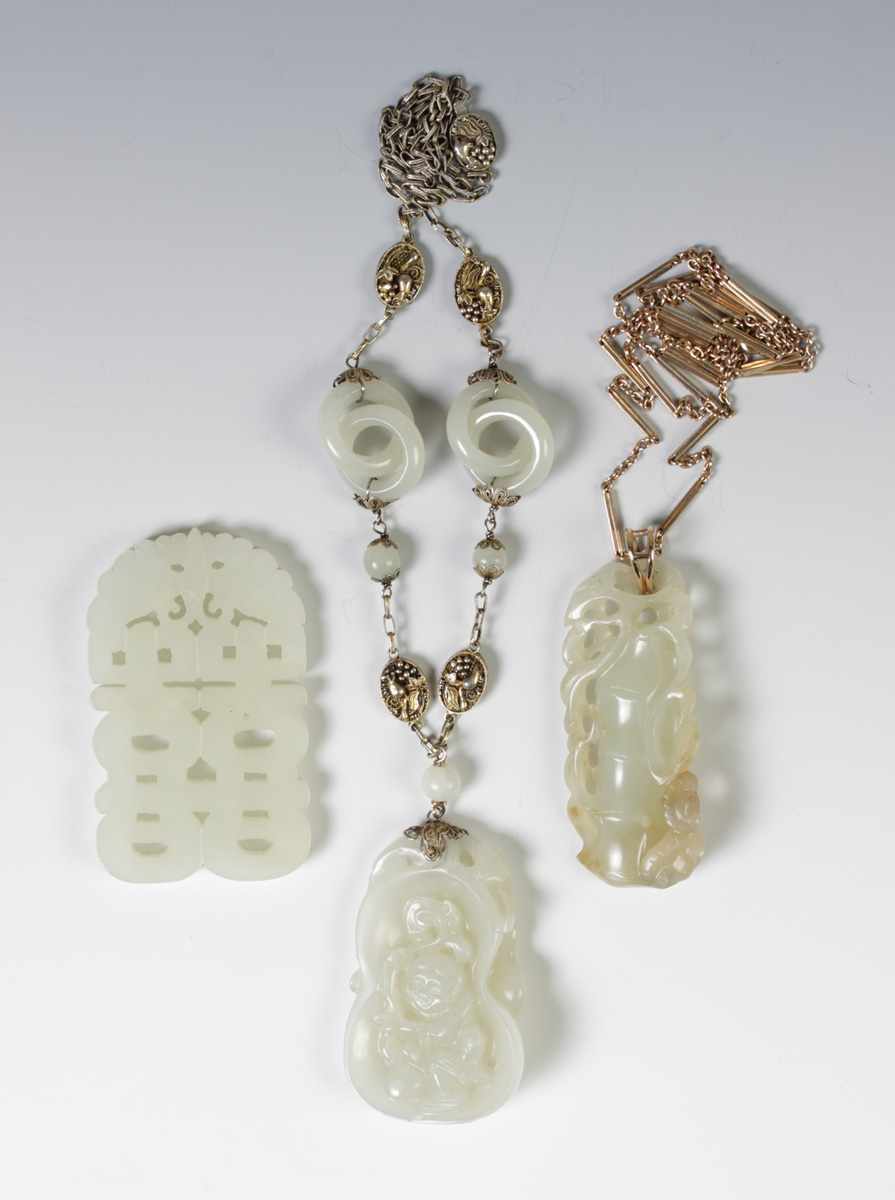 Appraisal: Carved Jade Pendants L to R Pendant carved w moth