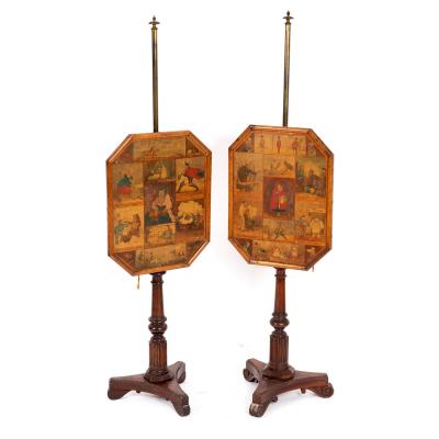 Appraisal: A pair of William IV simulated rosewood pole screens the