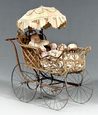 Appraisal: Rattan wood and steel doll buggy x x - in