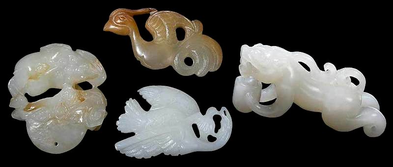 Appraisal: Four Carved Jade Toggles Chinese two creatures and two birds