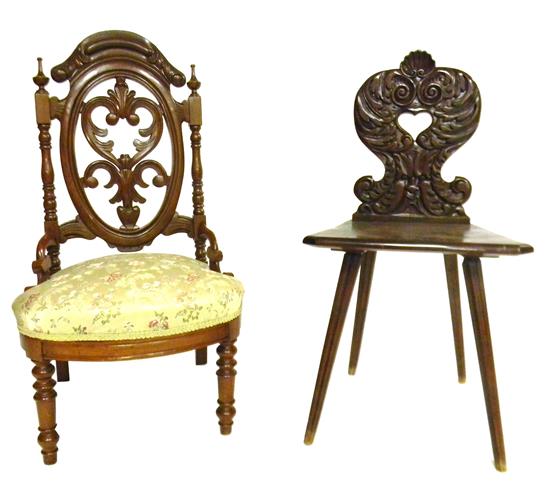 Appraisal: Two Victorian side chairs one elaborately carved slipper chair pierced