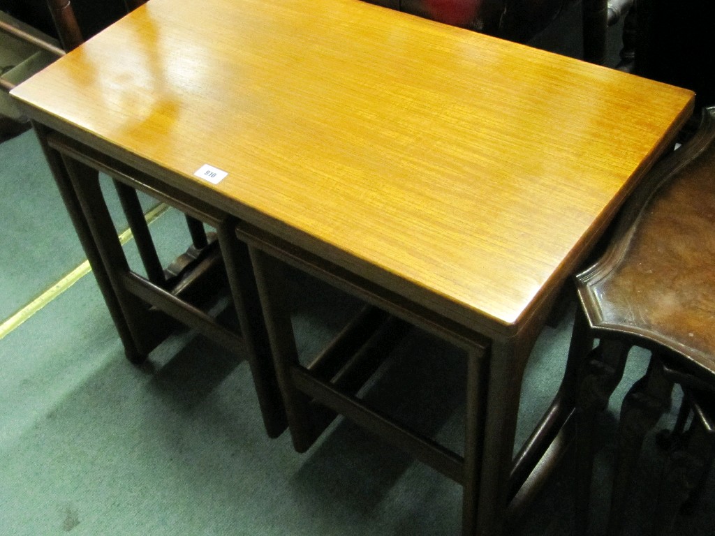 Appraisal: s nest of three tables with fold over top