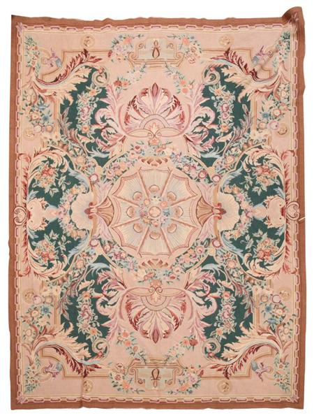 Appraisal: An Aubusson style needlepoint carpet the central rose-coloured fan medallion