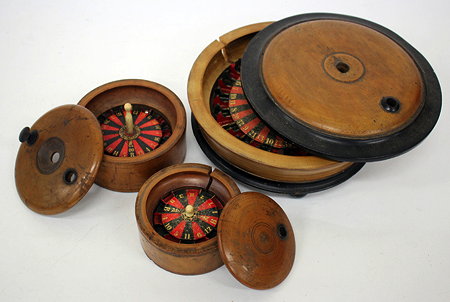 Appraisal: A GROUP OF THREE VARIOUS TURNED WOODEN ROULETTE WHEELS AND