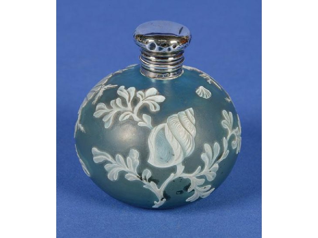 Appraisal: A LATE VICTORIAN SILVER MOUNTED SCENT BOTTLE the pale blue