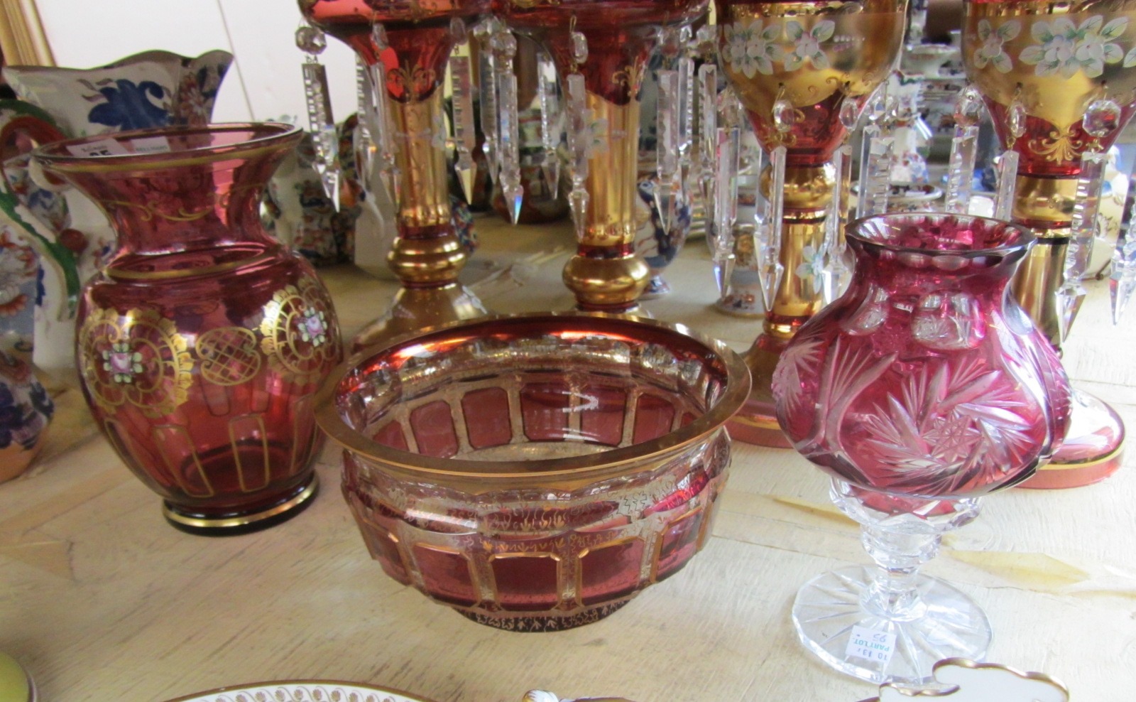 Appraisal: A ruby glass ovoid vase th century enamelled with panels