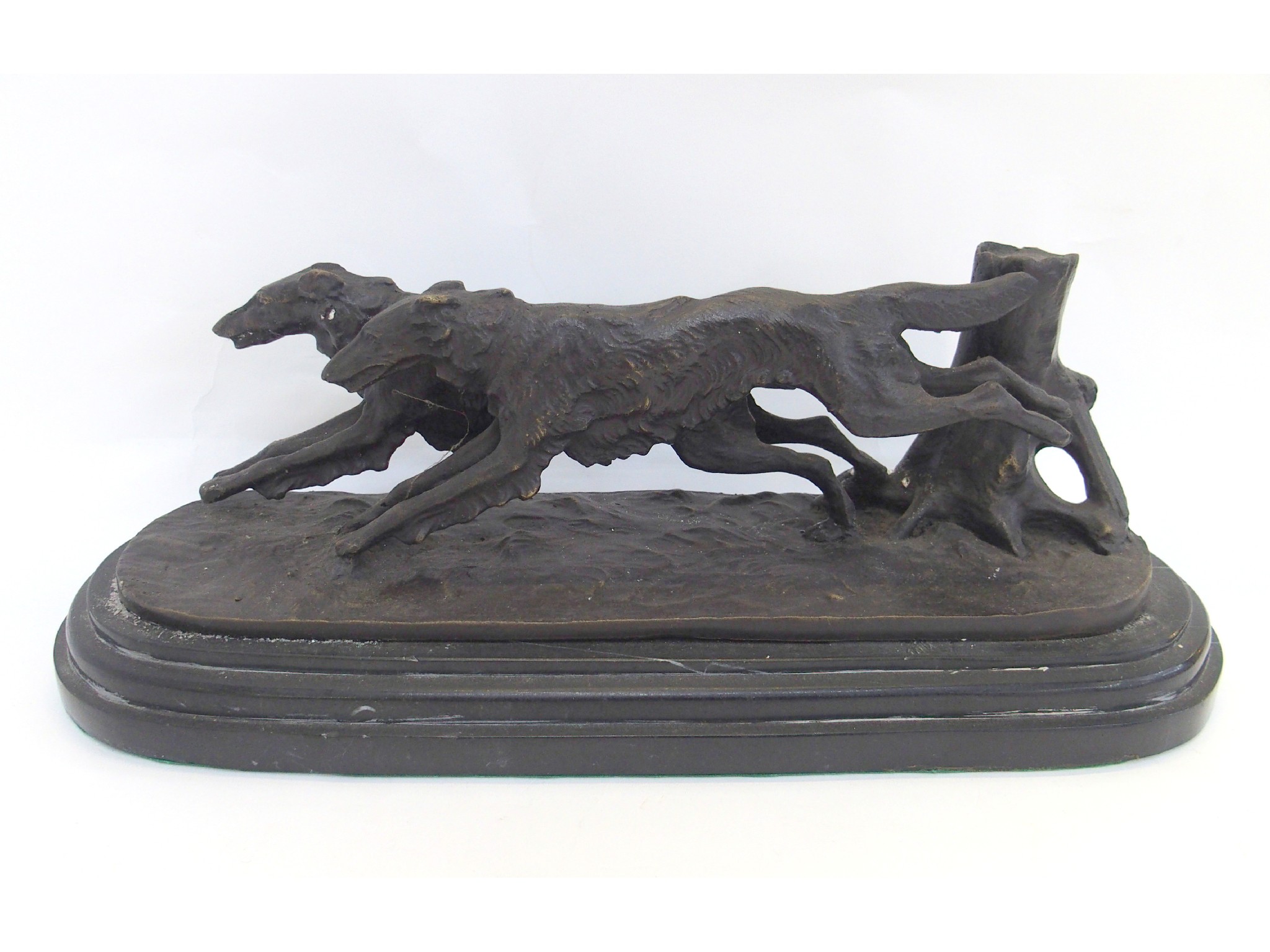 Appraisal: Bronzed metal group of two running hounds