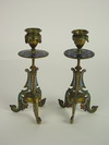 Appraisal: CANDLE STICKS - Pair of brass and champleve framed candle