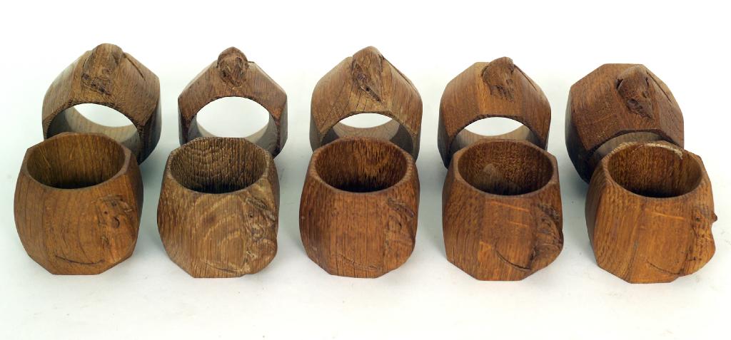 Appraisal: SET OF TEN ROBERT MOUSEMAN THOMPSON OAK NAPKIN RINGS each