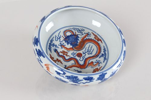 Appraisal: A CHINESE DRAGON-DECORATING BLUE AND WHITE FORTUNE PORC A Chinese