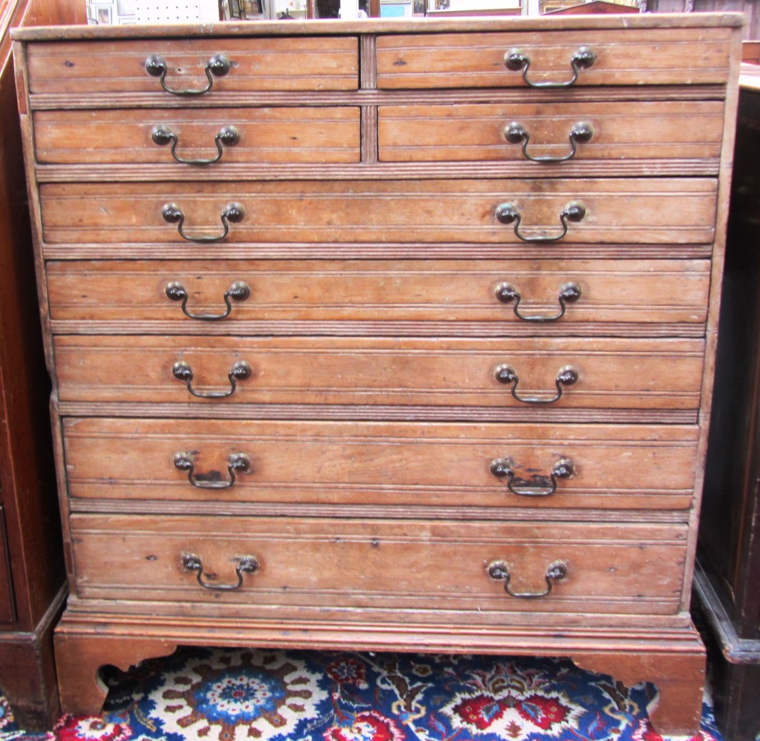 Appraisal: An early th century pine chest of four short and