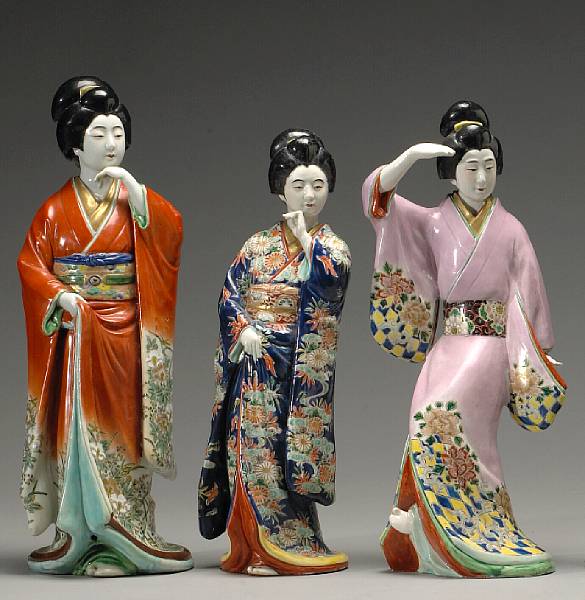 Appraisal: A group of three Kutani porcelain figures th Century Each