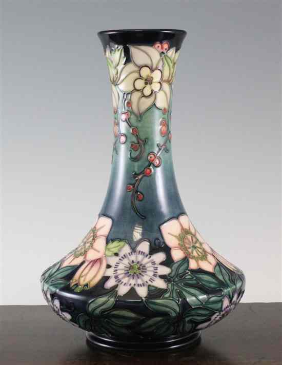 Appraisal: A Moorcroft 'Carousel' pattern onion shaped vase designed by Rachel