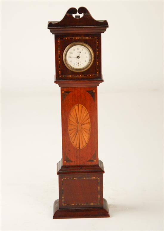 Appraisal: A Miniature Tall Case Clock with works marked W C