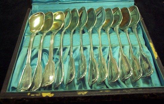 Appraisal: A set of twelve fiddle and thread pattern spoons monogrammed