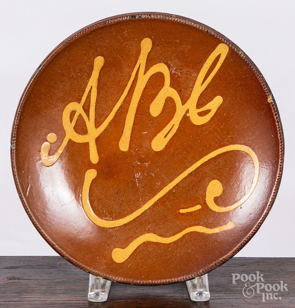 Appraisal: New England slip decorated redware ABC plate New England slip