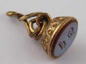 Appraisal: A gold plated agate seal with engraved initials stone approx