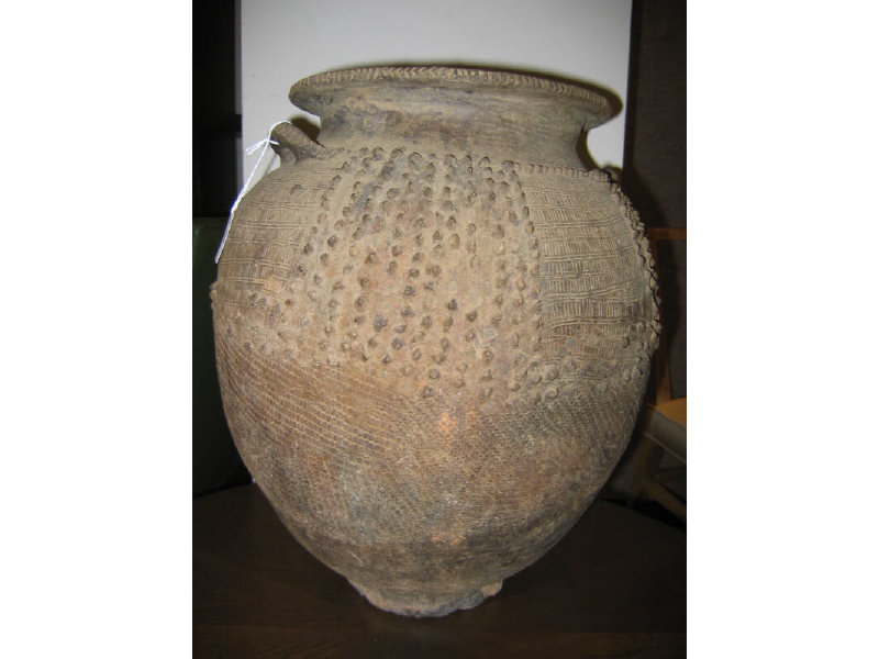 Appraisal: AFRICAN EARTHENWARE RELIEF DECORATED STORAGE JAR h Provenance Alexander Gallery