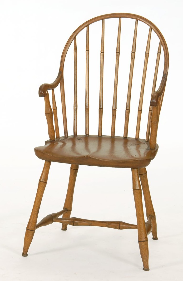 Appraisal: ANTIQUE AMERICAN BOWBACK WINDSOR ARMCHAIR New England Circa With seven-spindle