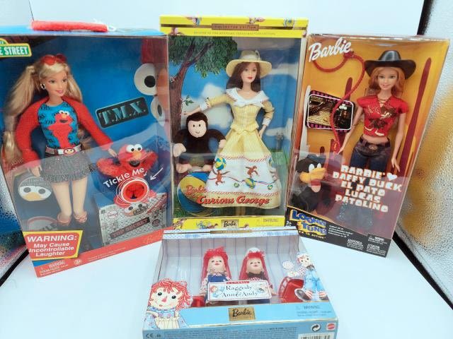 Appraisal: Barbie Dolls as characters Includes Barbie and Curious George Collector