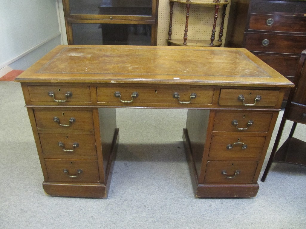 Appraisal: Mahogany kneehole desk with leather inset