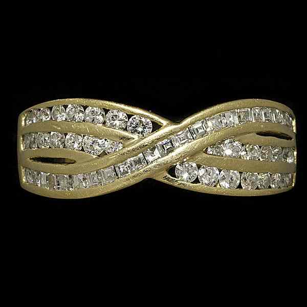 Appraisal: Triple Channel Diamond Ring A ladies k yellow gold ring