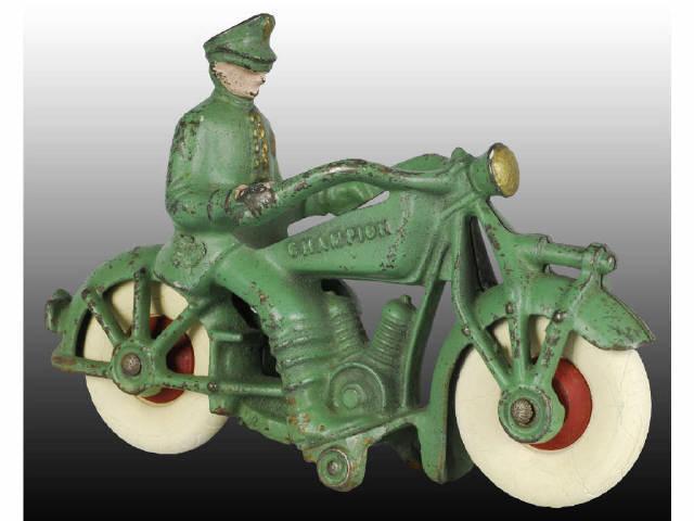 Appraisal: Cast Iron Green Champion Police Motorcycle Toy Description Motorcycle has