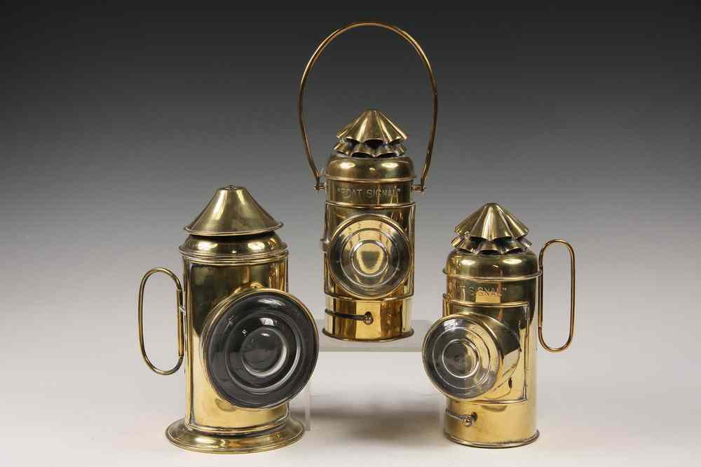 Appraisal: HANDHELD BOAT OIL LANTERNS - th c 'Boat Signal' Brass