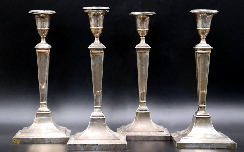 Appraisal: SILVER PAIR OF ENGLISH SILVER CANDLESTICKS Pair of engraved English