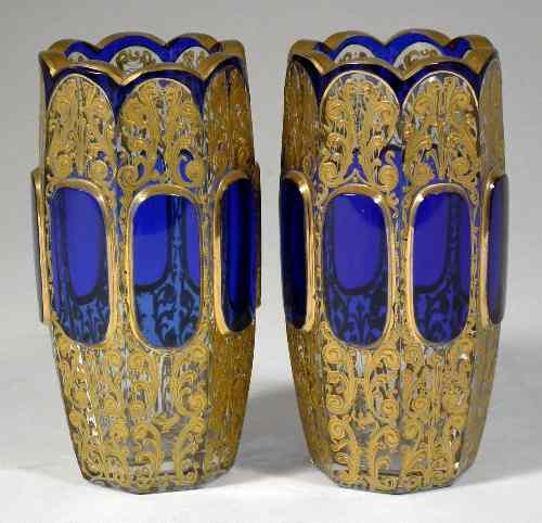 Appraisal: A pair of Bohemian blue flashed and gilt decorated heavy