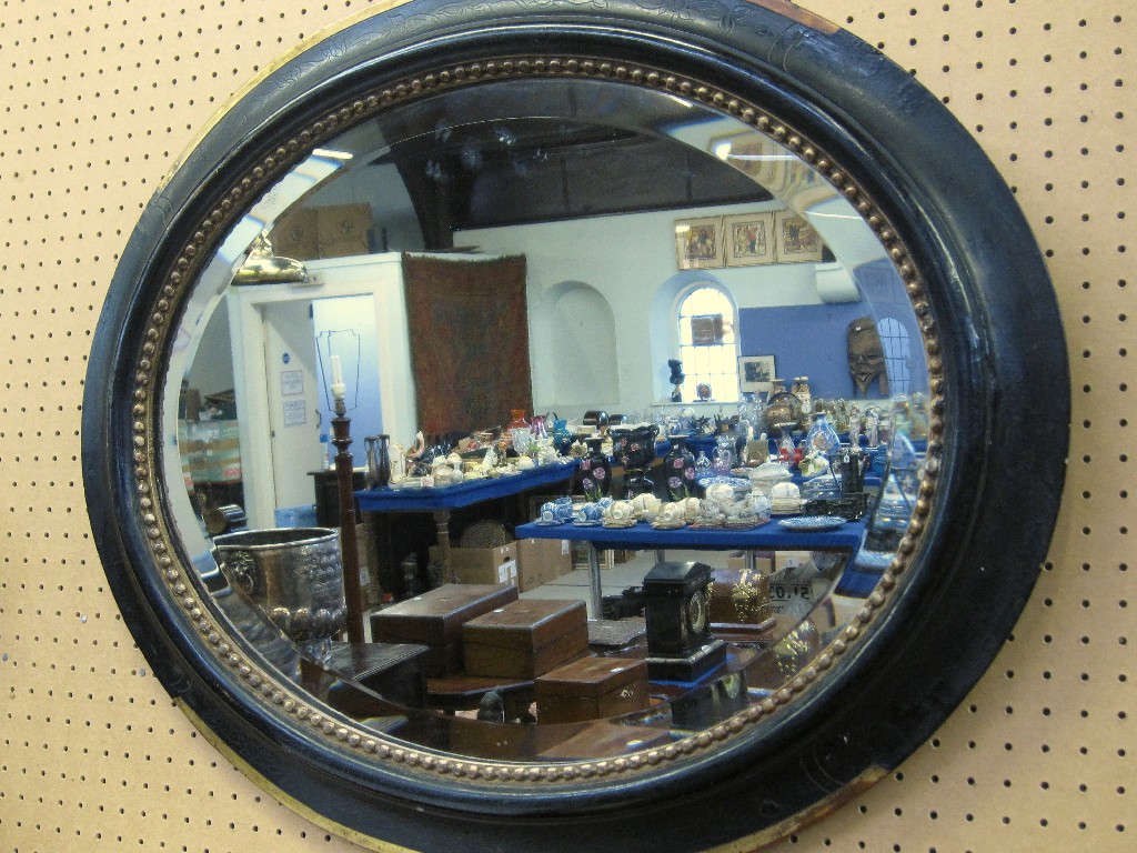 Appraisal: Ebonised and gilt trimmed wall mirror