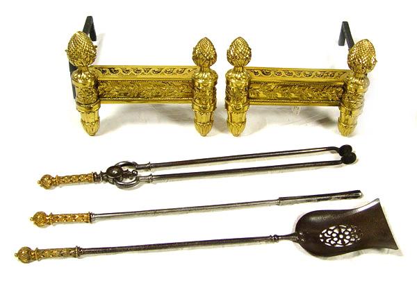 Appraisal: LOUIS XVI STYLE BRASS CHENET AND FIREPLACE TOOLS Elegant brass