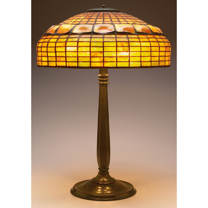 Appraisal: Exceptional Tiffany Studios table lamp bronze base supporting a bronze