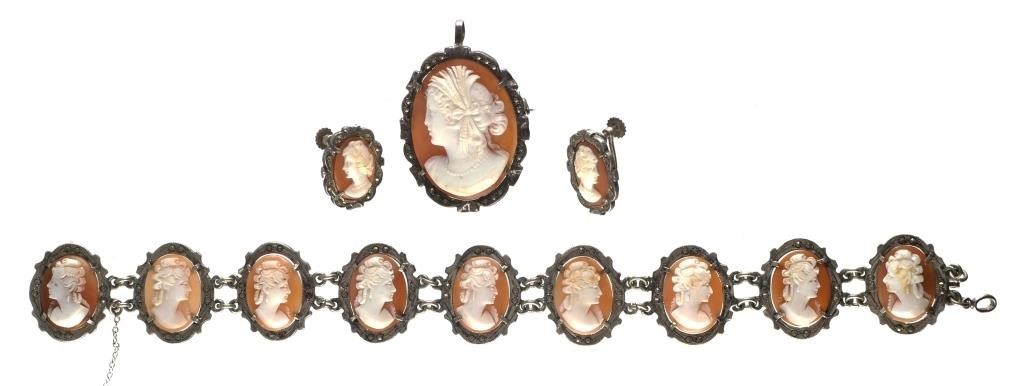 Appraisal: Three-piece set of shell cameo jewelry in silver including a